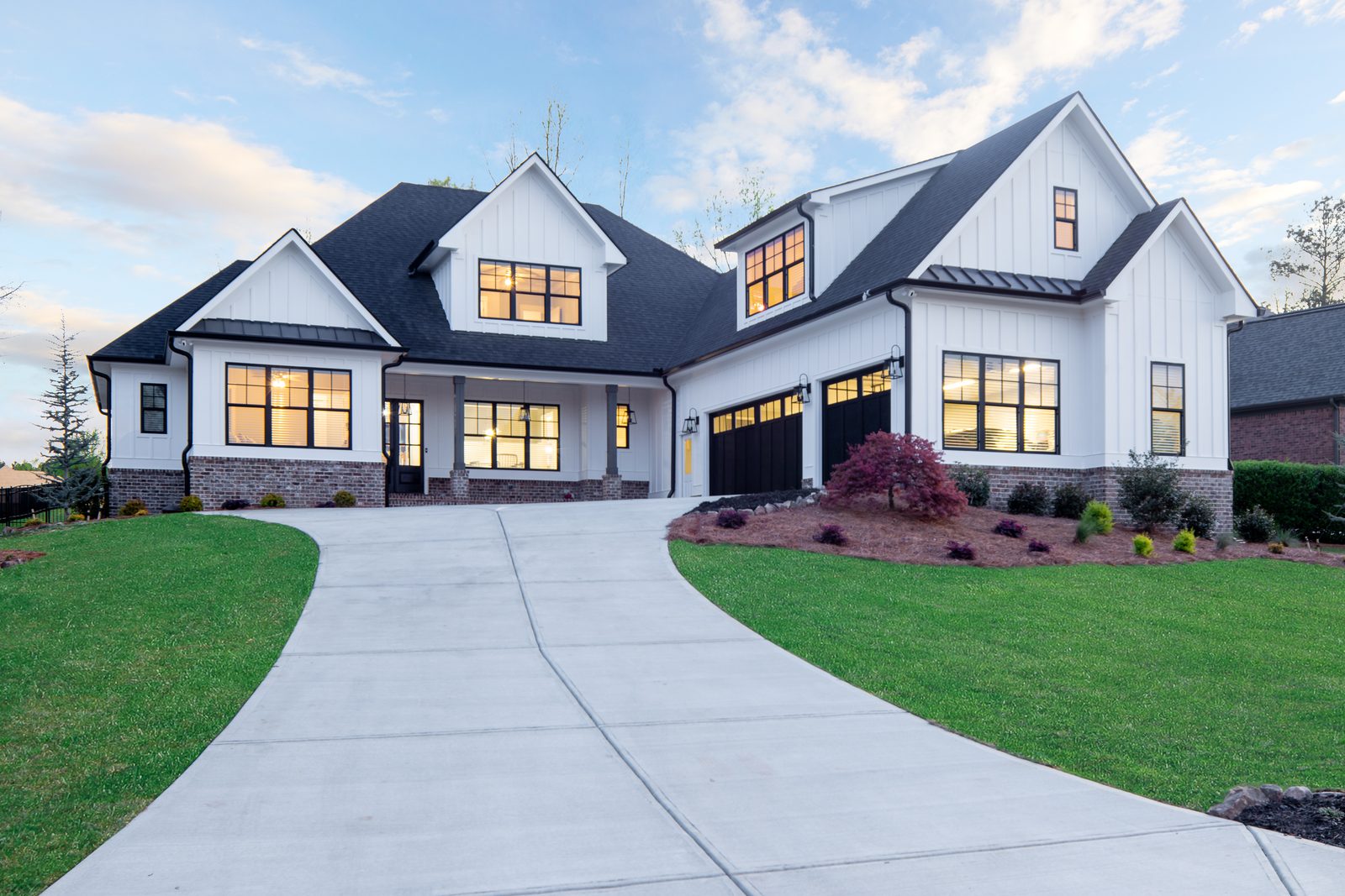 Front elevation from the curved driveway — Spring 2020 Custom Home, custom home built by Ironwood Construction Group